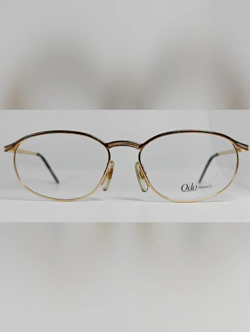 Manola Odo Frames Round Gold-Tone. Glasses with Subtle Copper Weathered Patina.